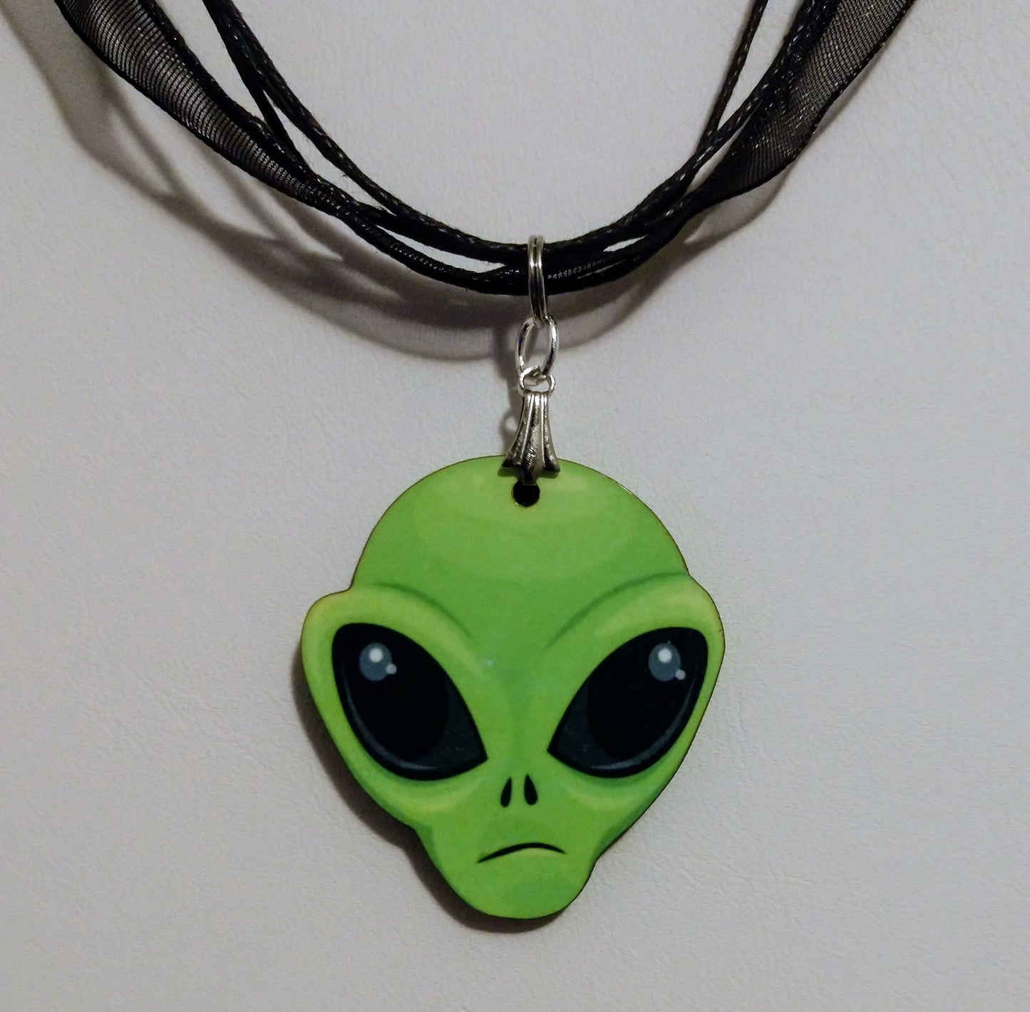 Alien charm necklace